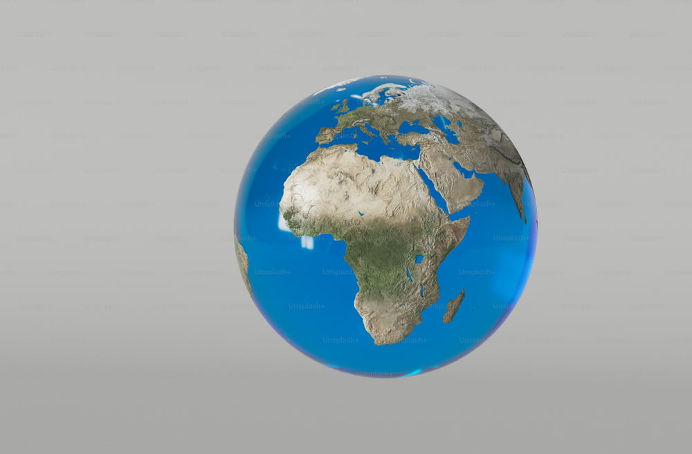 a blue and white globe with a gray background