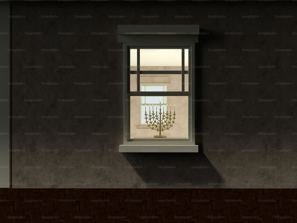a window with a chandelier hanging from it's side