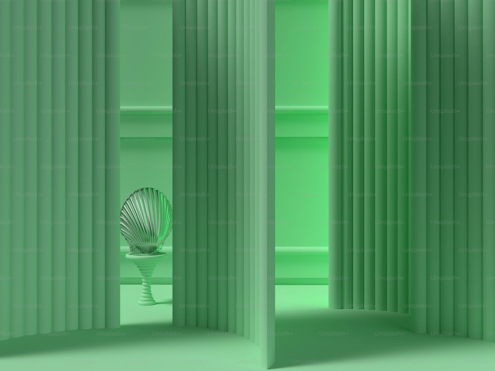 Una habitación con una pared verde y una silla verde
