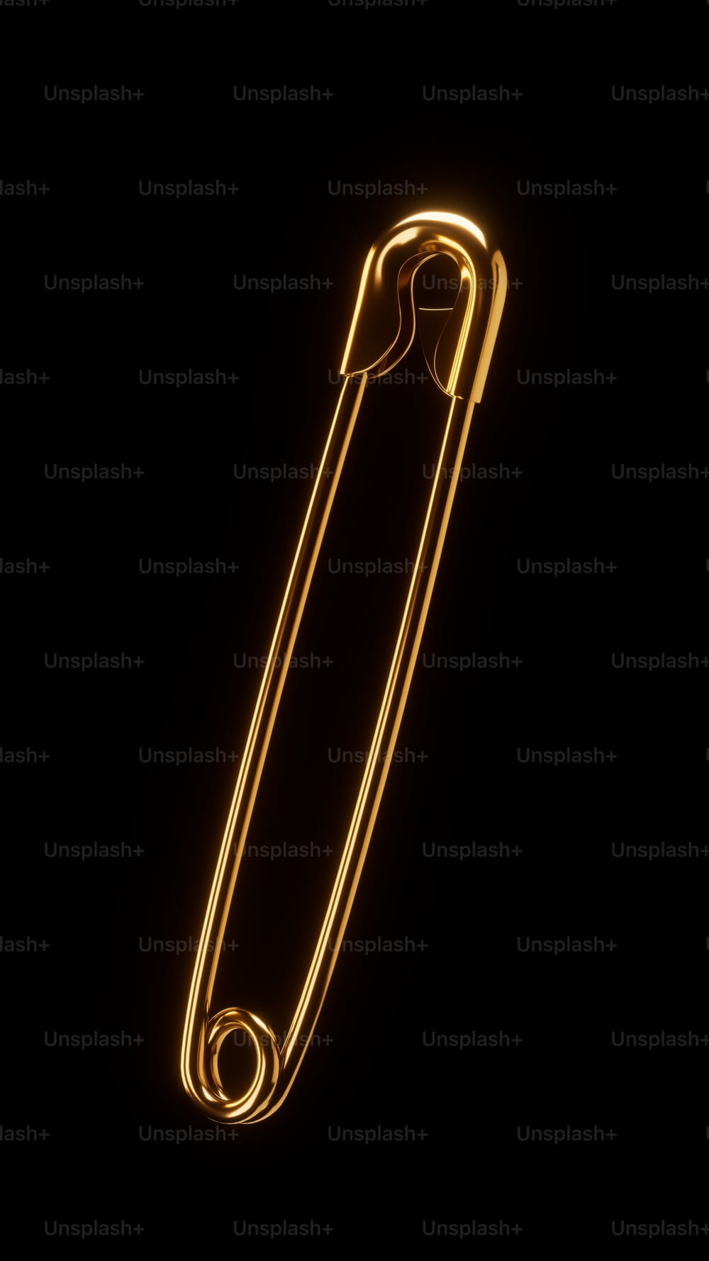 a gold colored paper clip on a black background