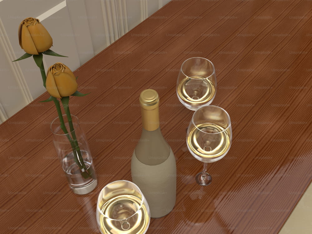 테이블 위의 와인 세 잔과 와인 한 병