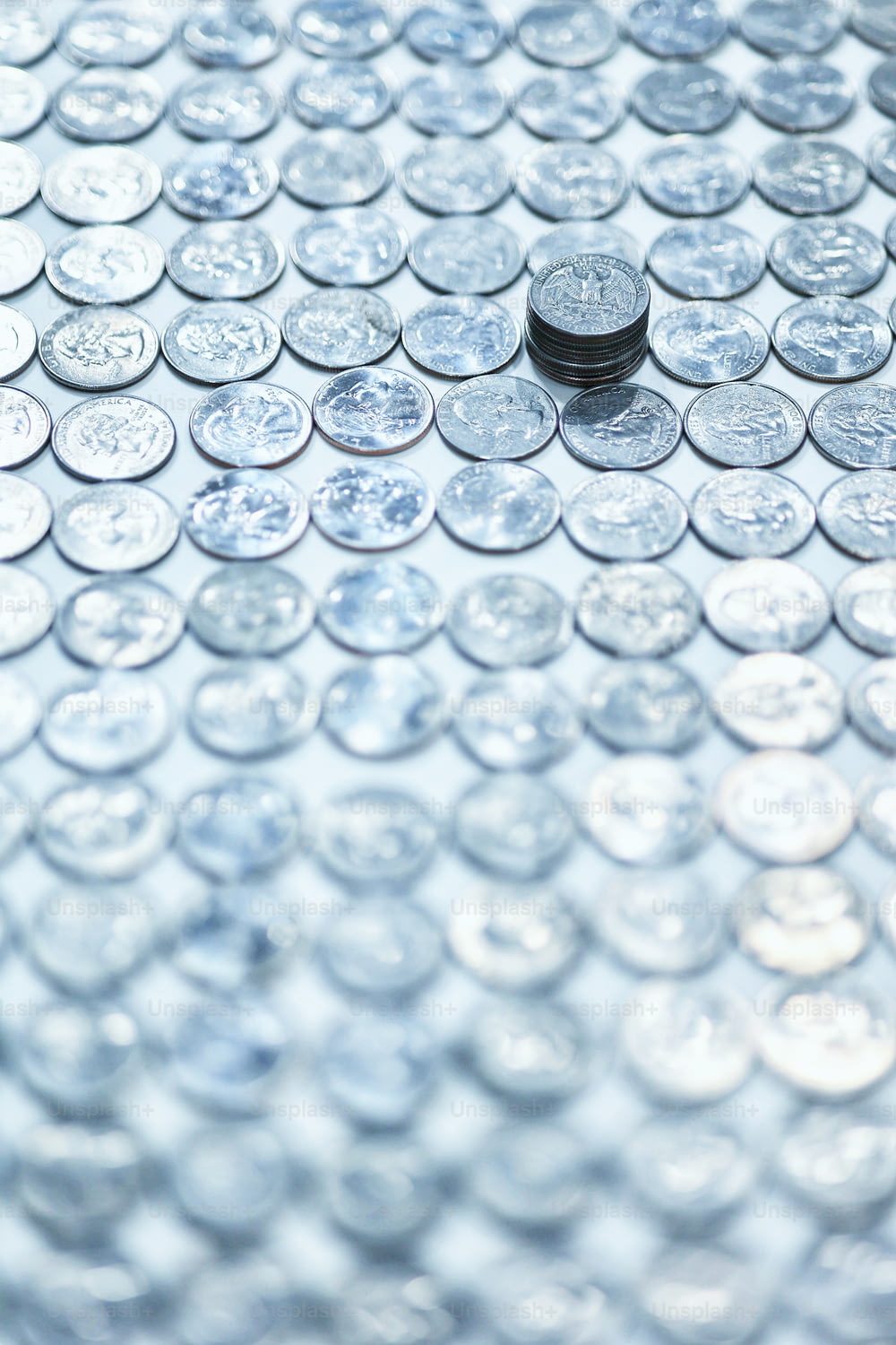a close up of a pile of coins