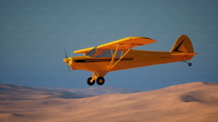 Un piccolo aeroplano giallo che sorvola un deserto