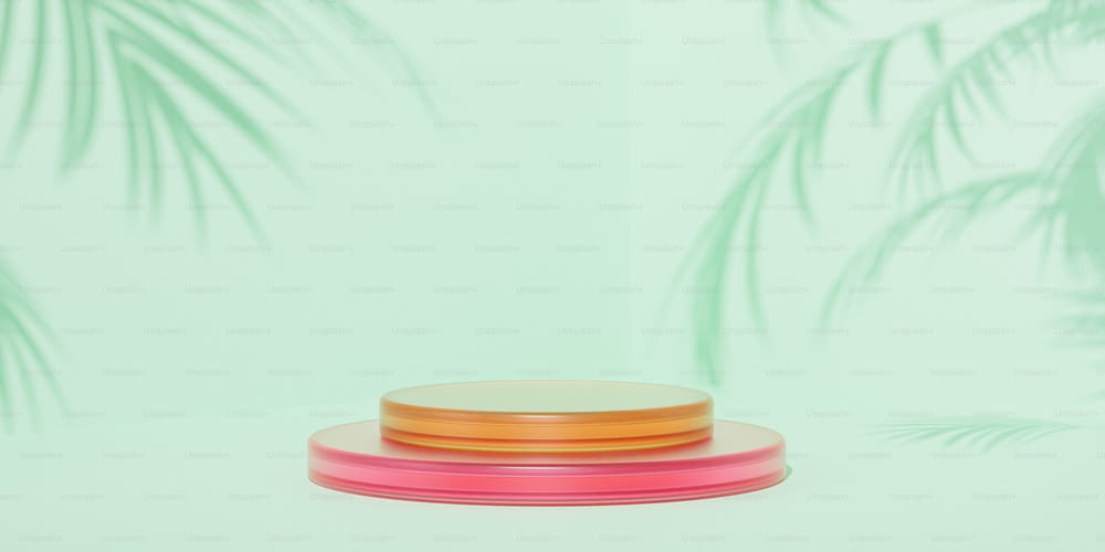 a stack of three pink and orange plates