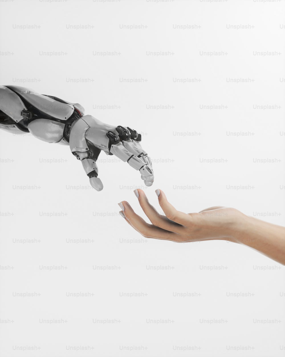 a hand reaching out towards a robot hand