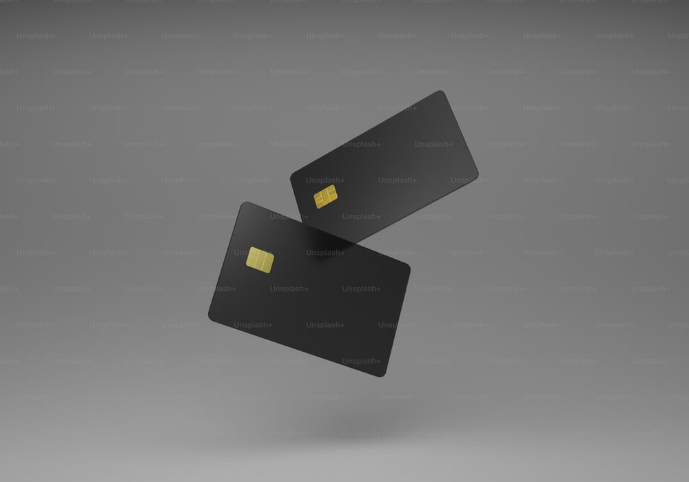um cartão de crédito preto voando pelo ar