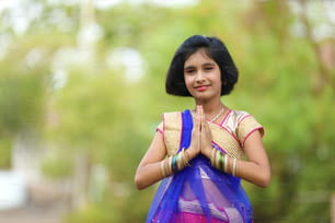 Little Indian girl in traditional sari