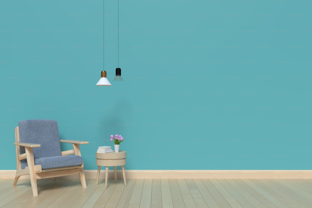 The living room walls blue Within an armchair and lamp,3D rendering