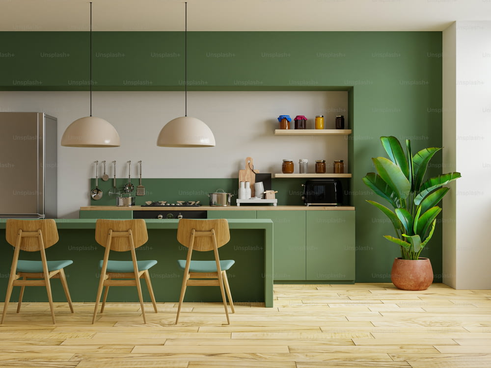 緑の壁を持つモダンなスタイルのキッチンインテリアデザイン.3Dレンダリング