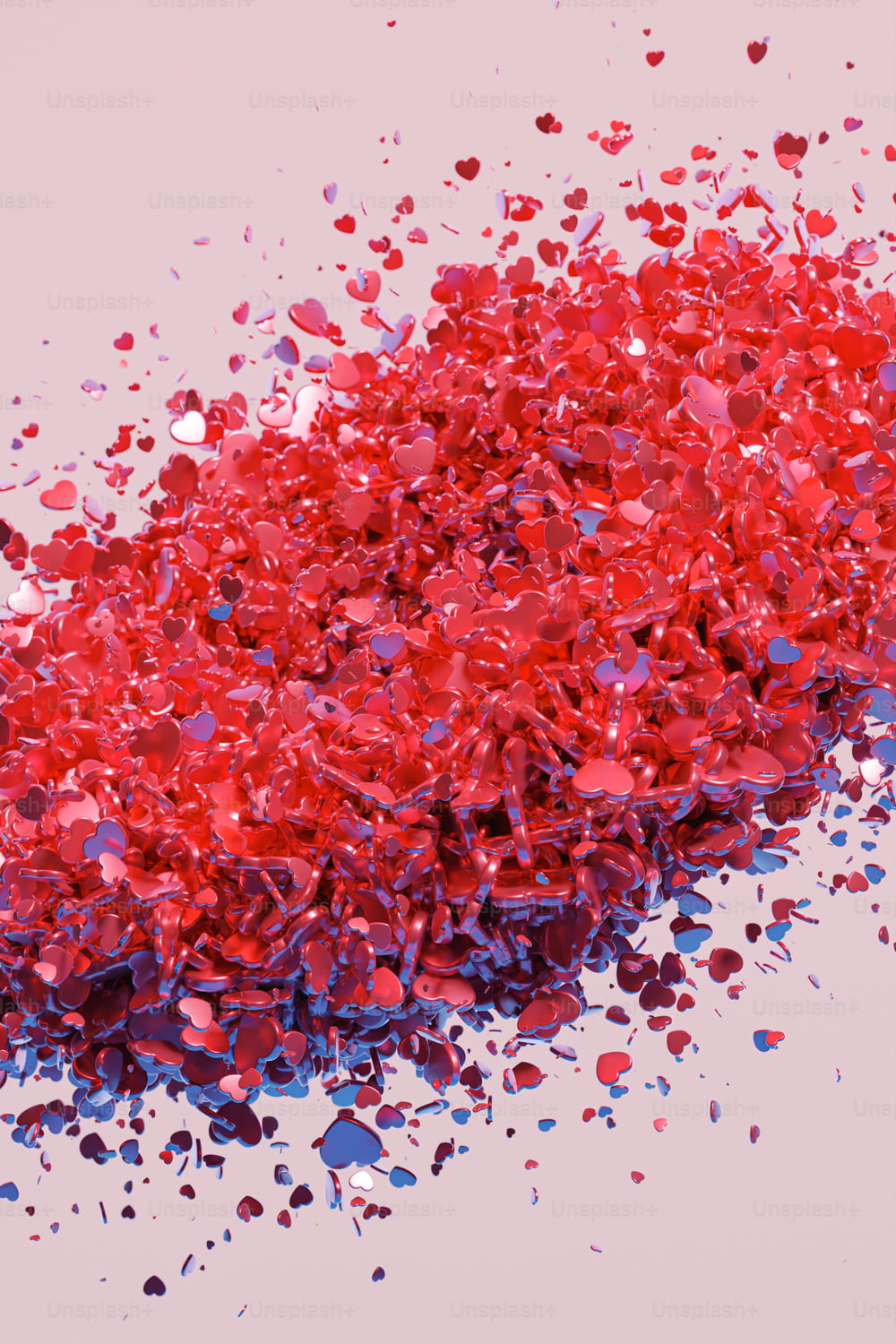 a pile of red confetti sitting on top of a table