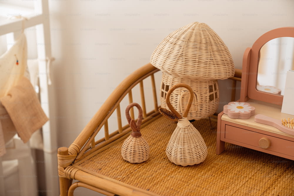 a wicker basket sitting on top of a wooden table