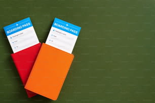 a pair of orange and red business cards