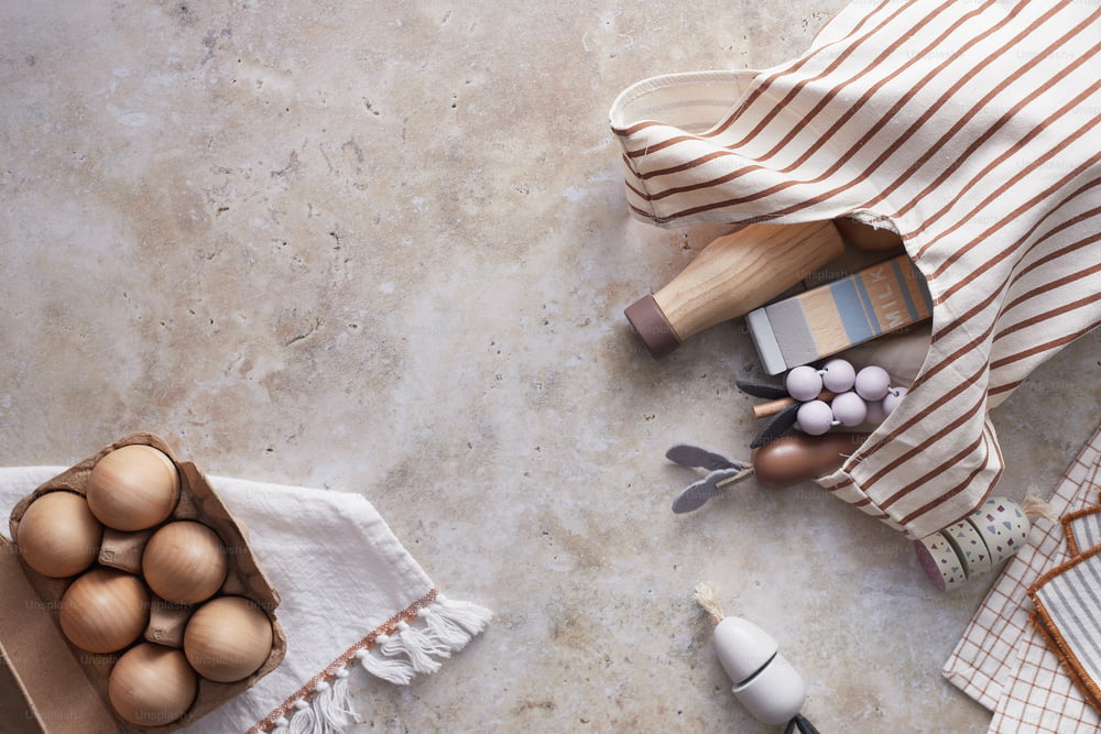 an overhead view of a kitchen counter with eggs and utensils