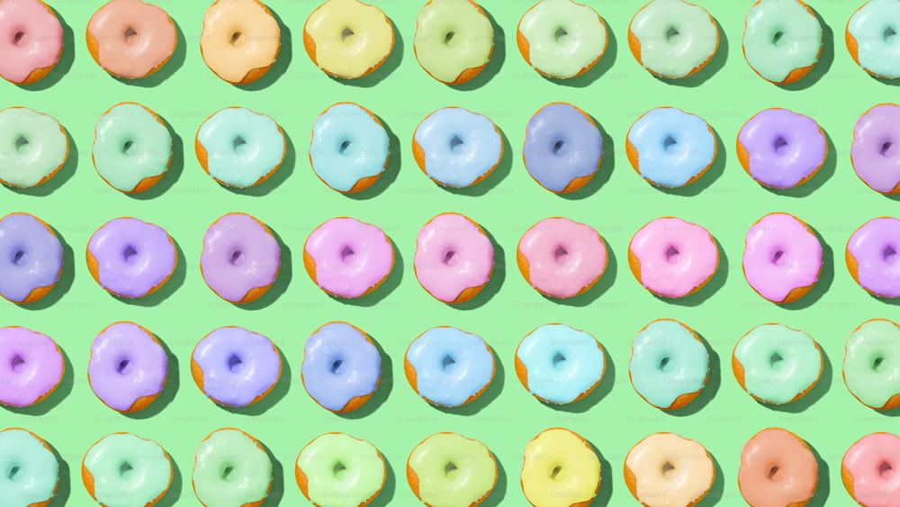 viele Donuts, die auf einer grünen Fläche stehen