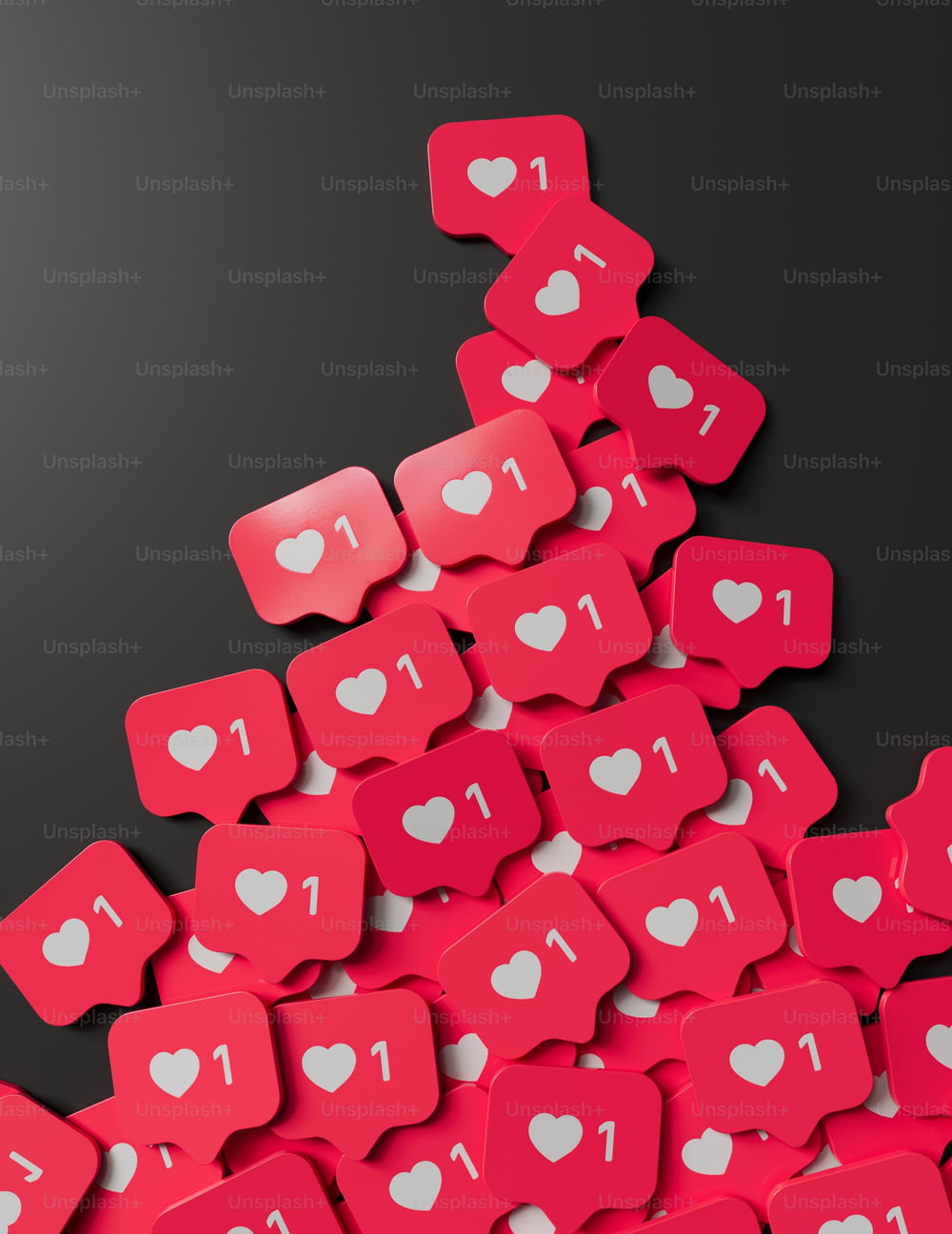 a pile of red hearts with white hearts on them
