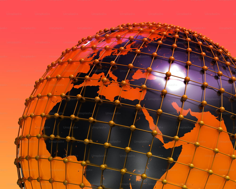 an orange and black globe with a red background