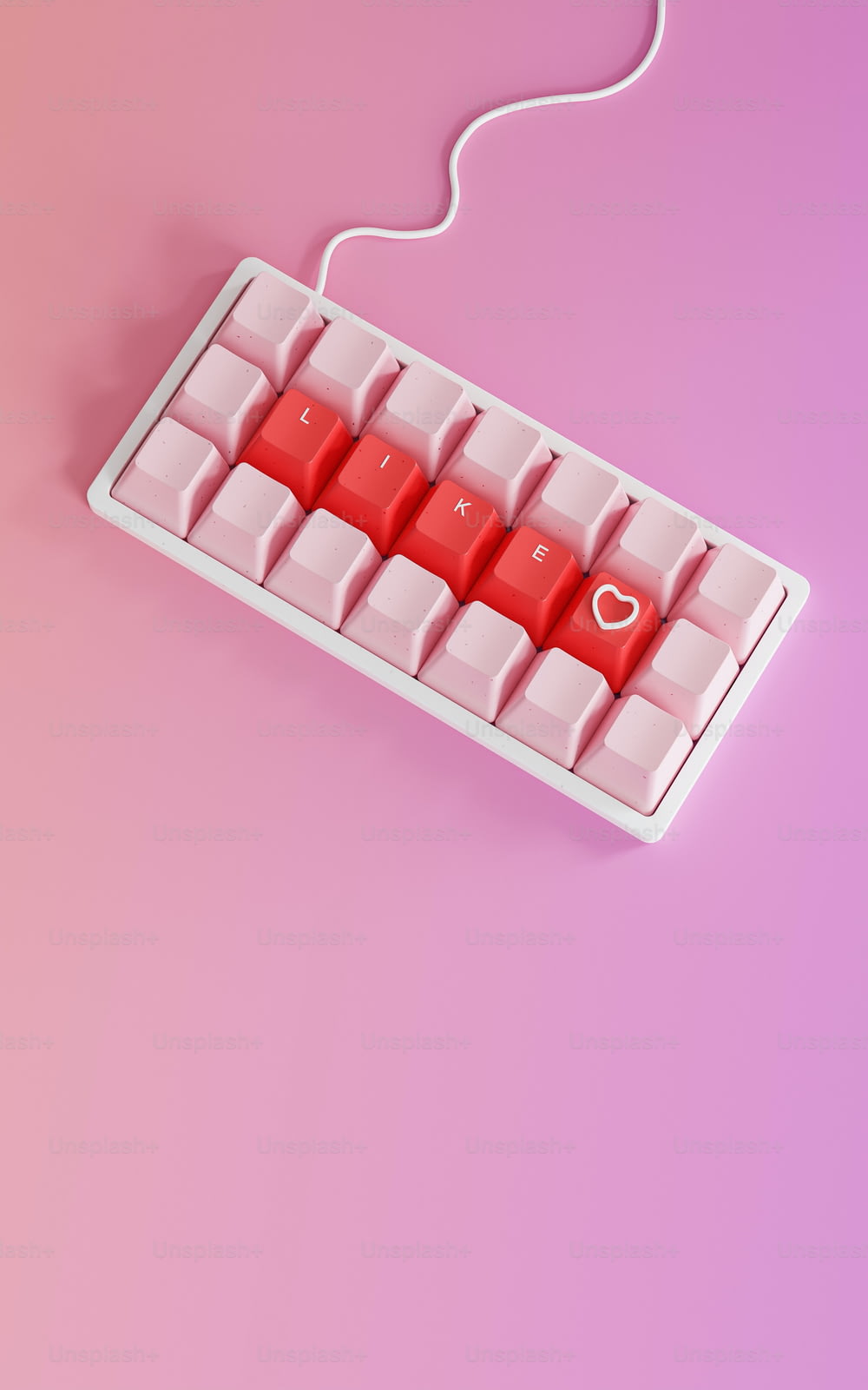 Un clavier rouge avec un cœur dessus