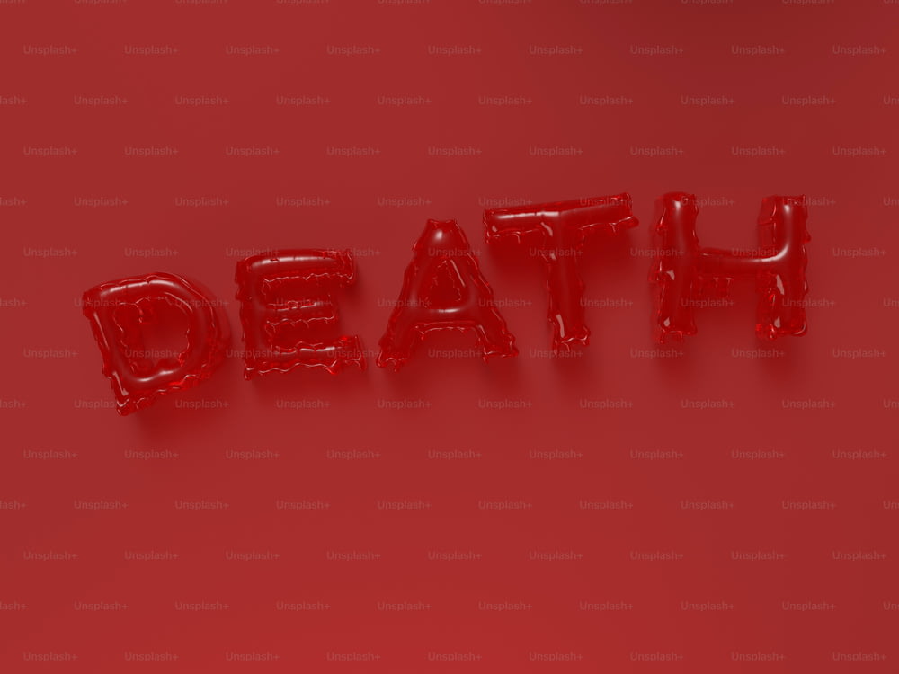 赤い背景に「死」と綴られた