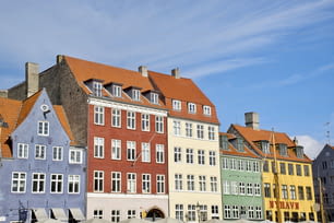 a row of colorful buildings on a sunny day