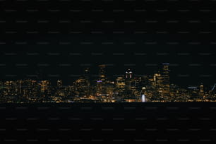 a view of a city at night from across the water
