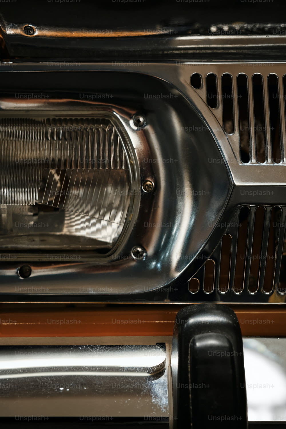 a close up of a grill with a light on
