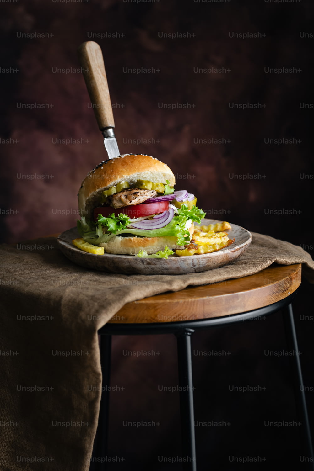 a large sandwich sitting on top of a wooden table