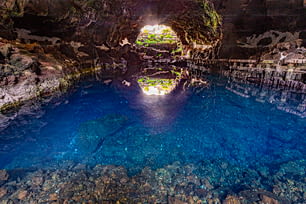 cave Jameos del Agua, scenic cave with lake in Lanzarote, Canary Islands, Spain