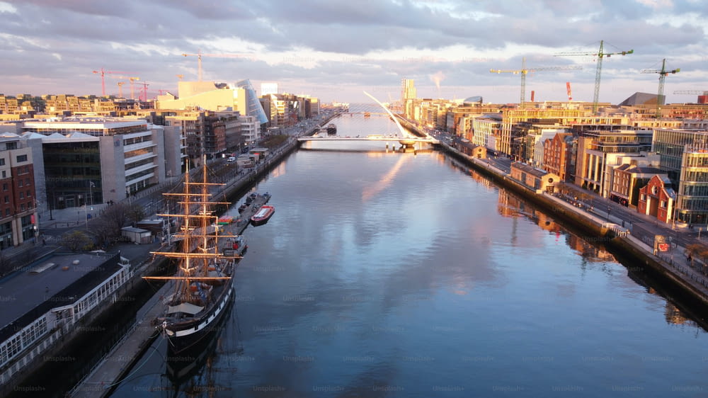 An aerial view of the fabulous Samuel Beckett Bridge with modern buildings in Dublin, Ireland