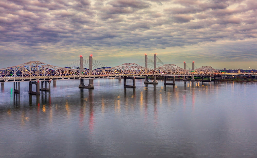 An aerial view of bridge over Ohio river in Louisville during sunset