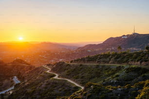 A scenic view of the Griffith park with its mountainous landscape in Los Angeles at sunset, CA, USA