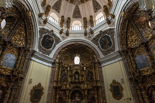 Inside view of one of the side chapels in the Colegiata de Antolin church in Toledo, a side church built in the XVII century in exalted baroque style as an extension to the Colegiata.
