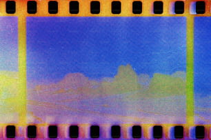 a film strip with a blue sky in the background