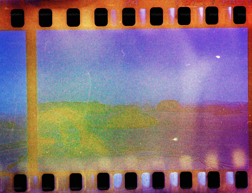 a film strip with a picture of a landscape on it