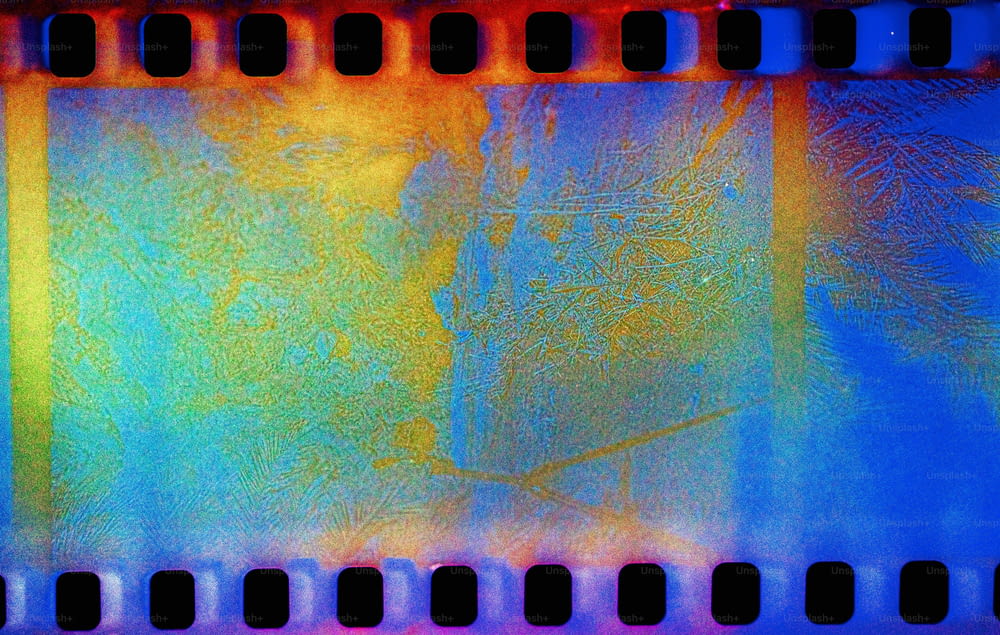 a close up of a film strip with a blurry background