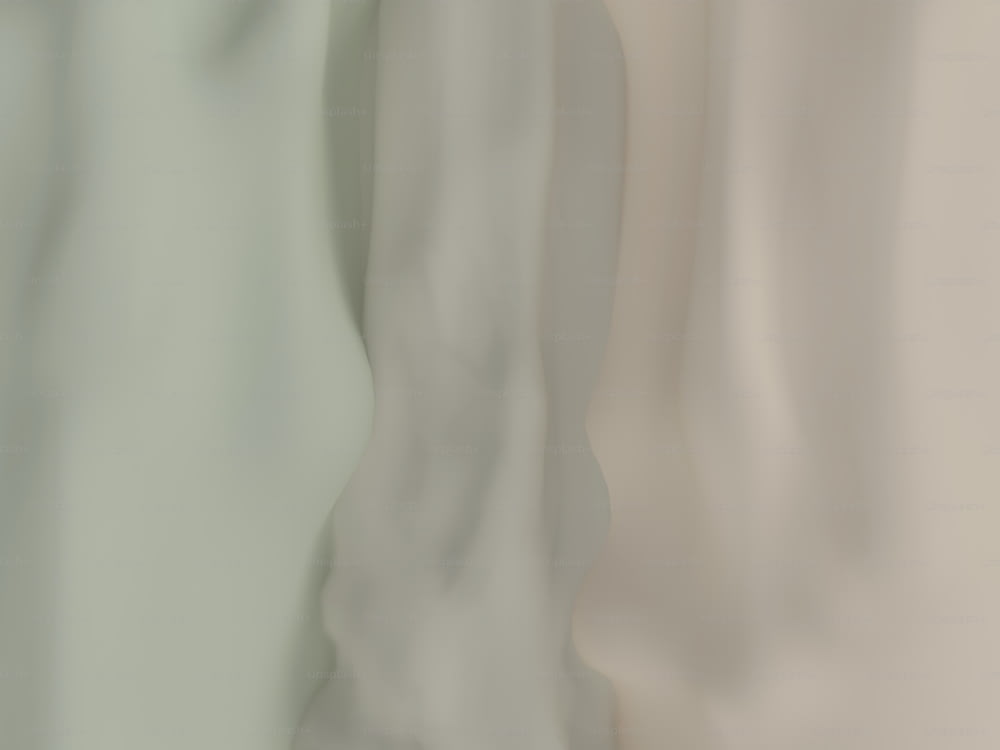 a blurry photo of a white curtain