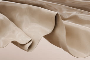 a close up view of a beige fabric