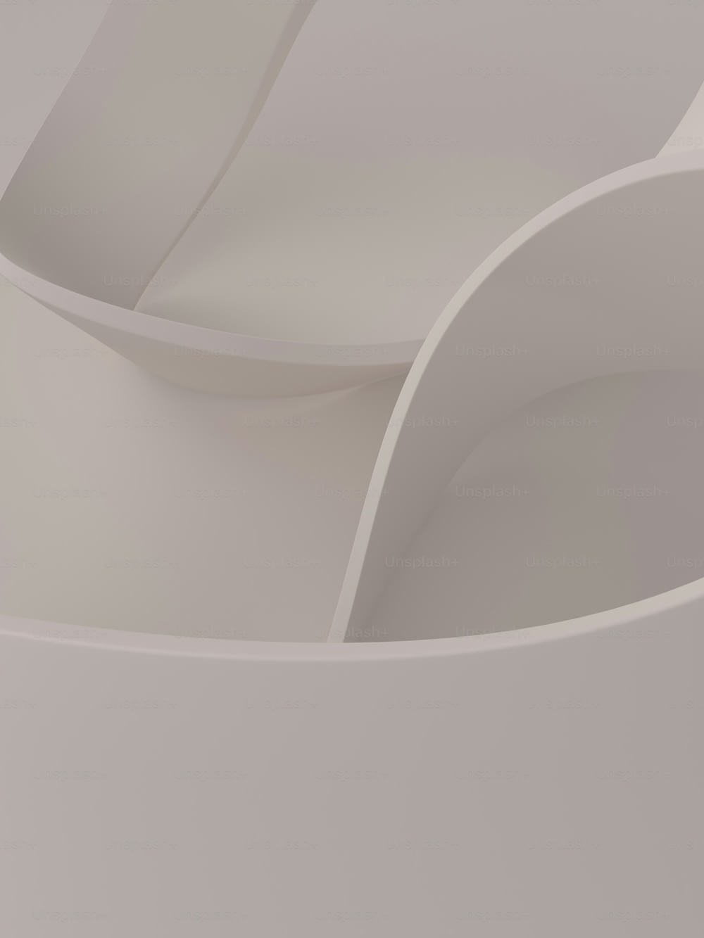um close up de um objeto branco com bordas curvas
