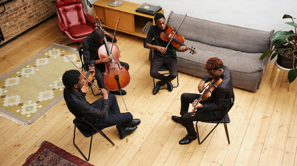a group of people playing instruments in a living room