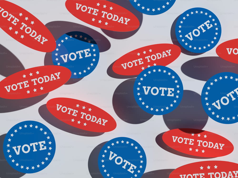 a group of red, white and blue stickers with vote today written on them