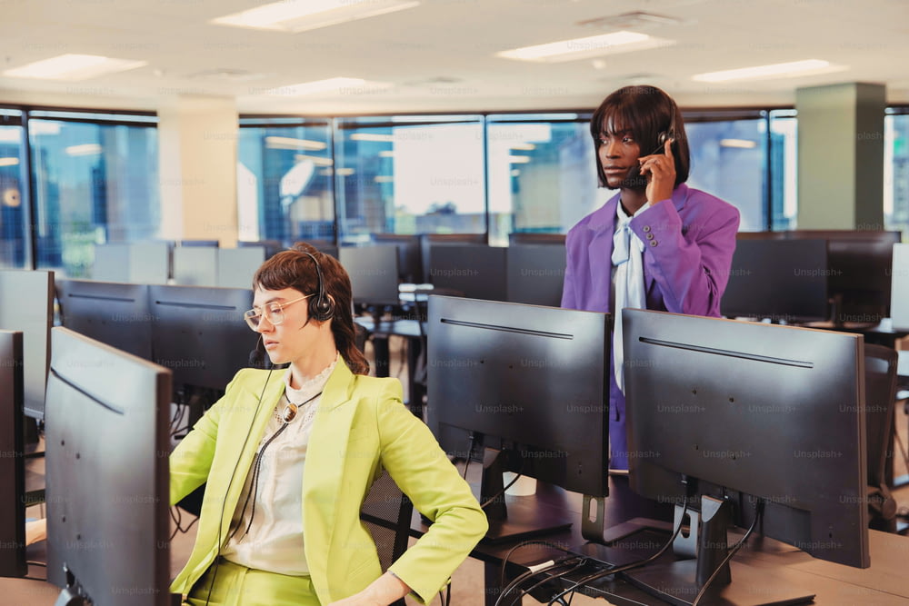 a man and a woman in a call center