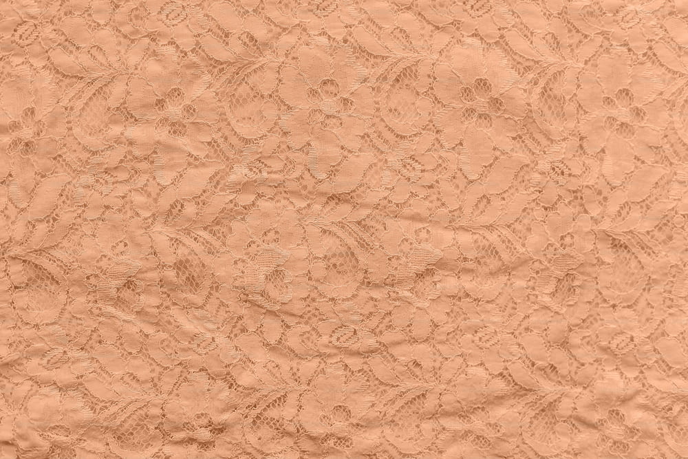 a close up of a textured paper with a design on it