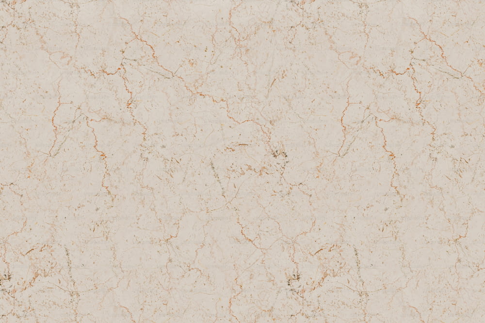 a close up of a white marble surface