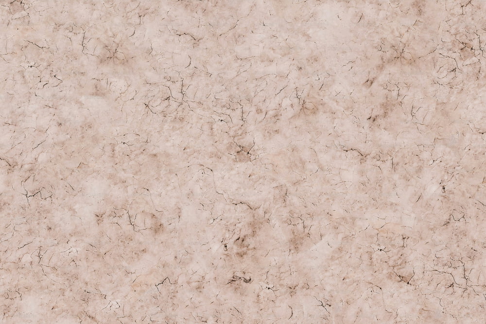 a close up of a beige marble texture