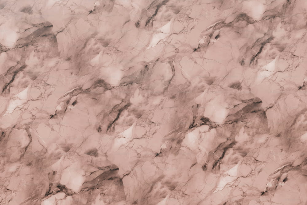 a close up view of a marble wall
