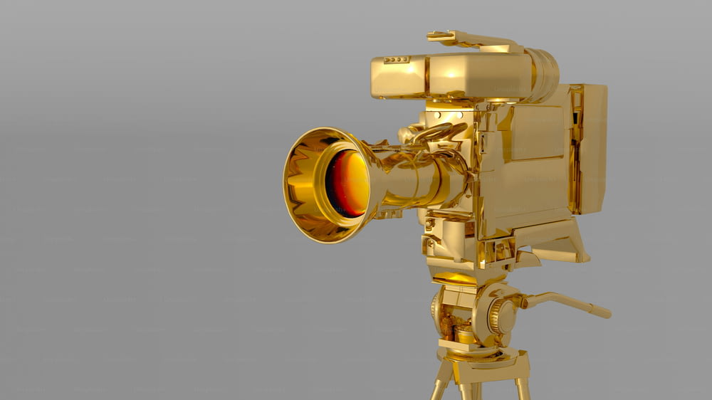 a golden object with a large lens on top of it