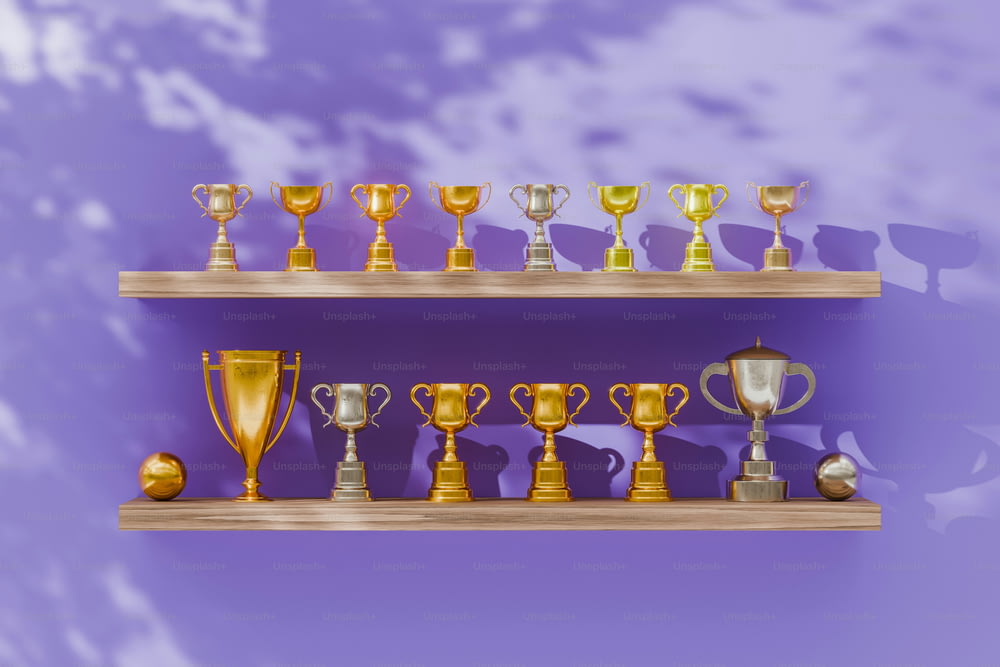 a row of shelves filled with trophies on top of each other
