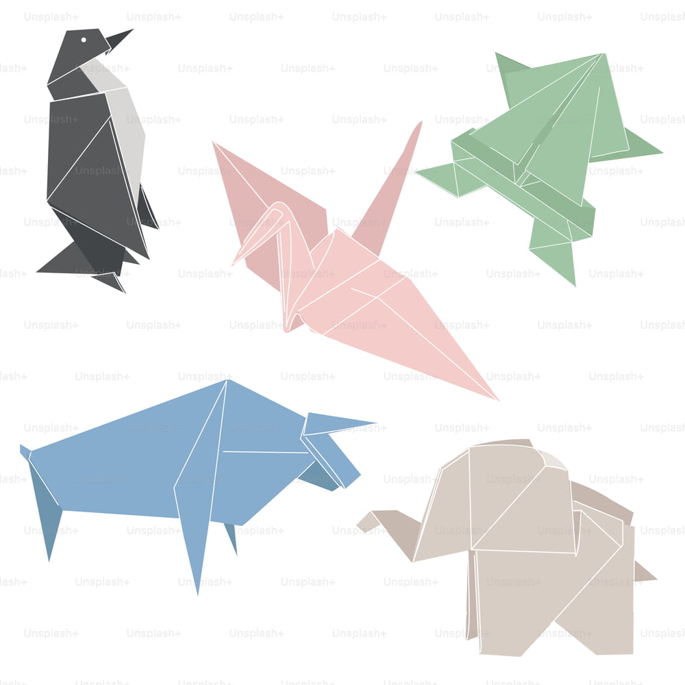 A cute set of origami animals. Japanese folded paper figurine. Penguin, crane, bull, elephant, frog. Isolated on white.